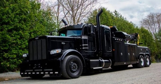 Impressive Peterbilt All Black With NRC 50CS Leaving The Factory