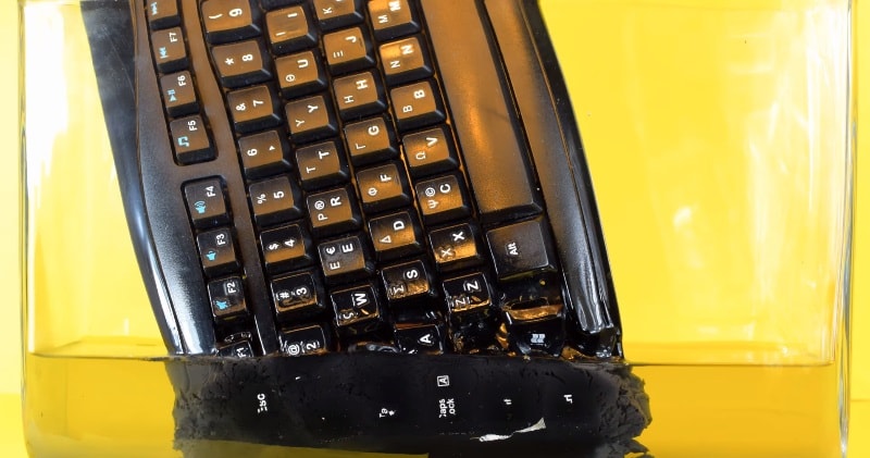 A Computer Keyboard Melting In Acetone