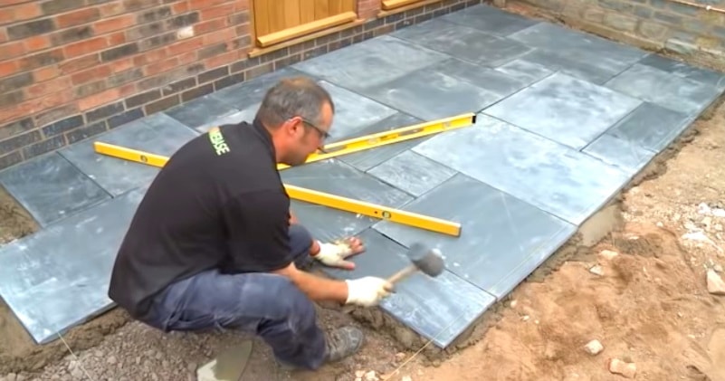 laying paving slabs